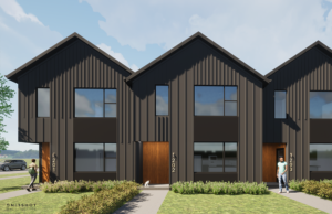 Exterior rendering of row townhomes with dark gray board and batten siding. Accent lighting illuminate the entries in front of green grass.